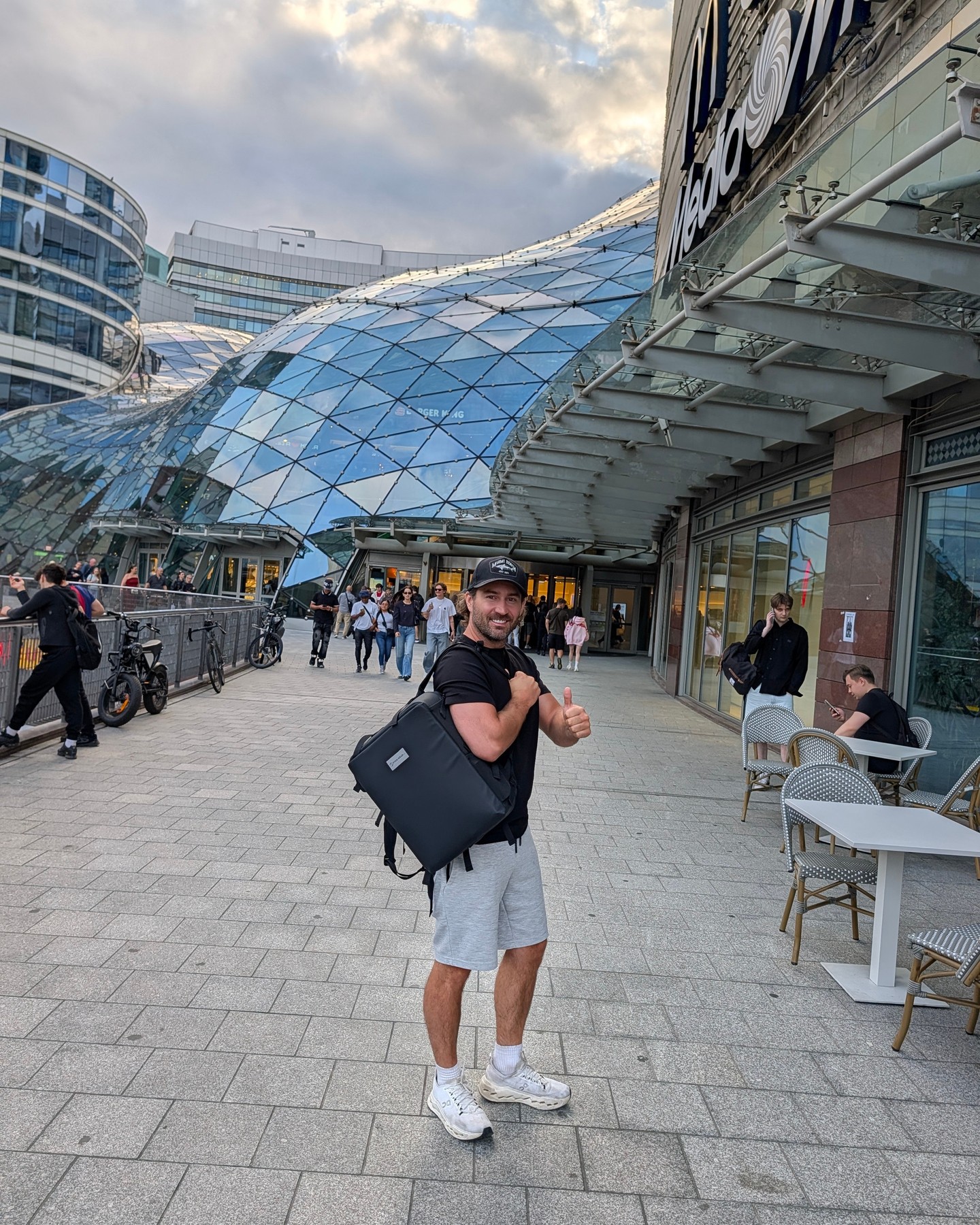 POV: you packed a week into one backpack and still got to skip the check-in line 🧳

Black tee, thumbs up, zero luggage 