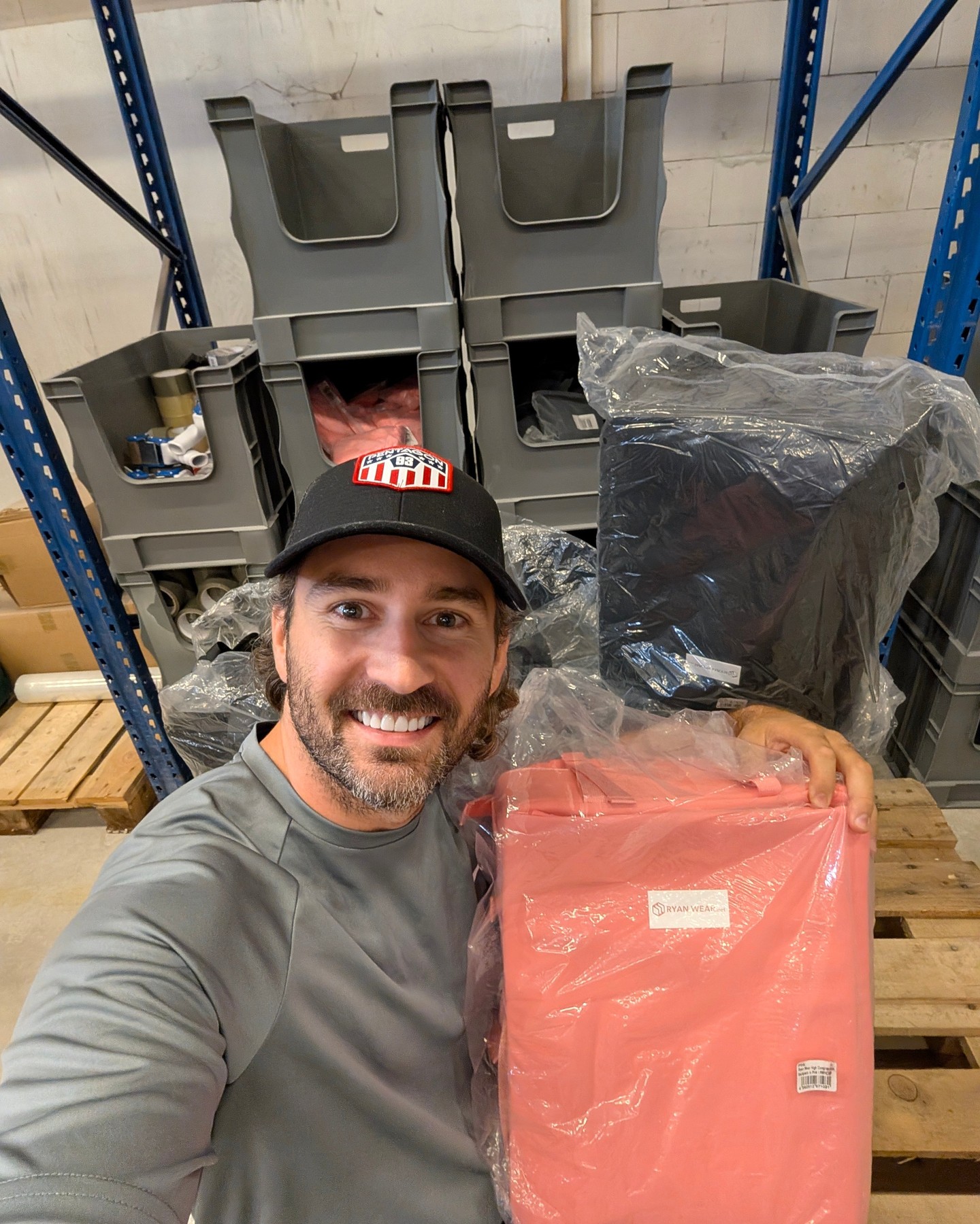 POV: your order is somewhere in this warehouse getting loved before it ships ✈️ Fresh pink and black compression backpac